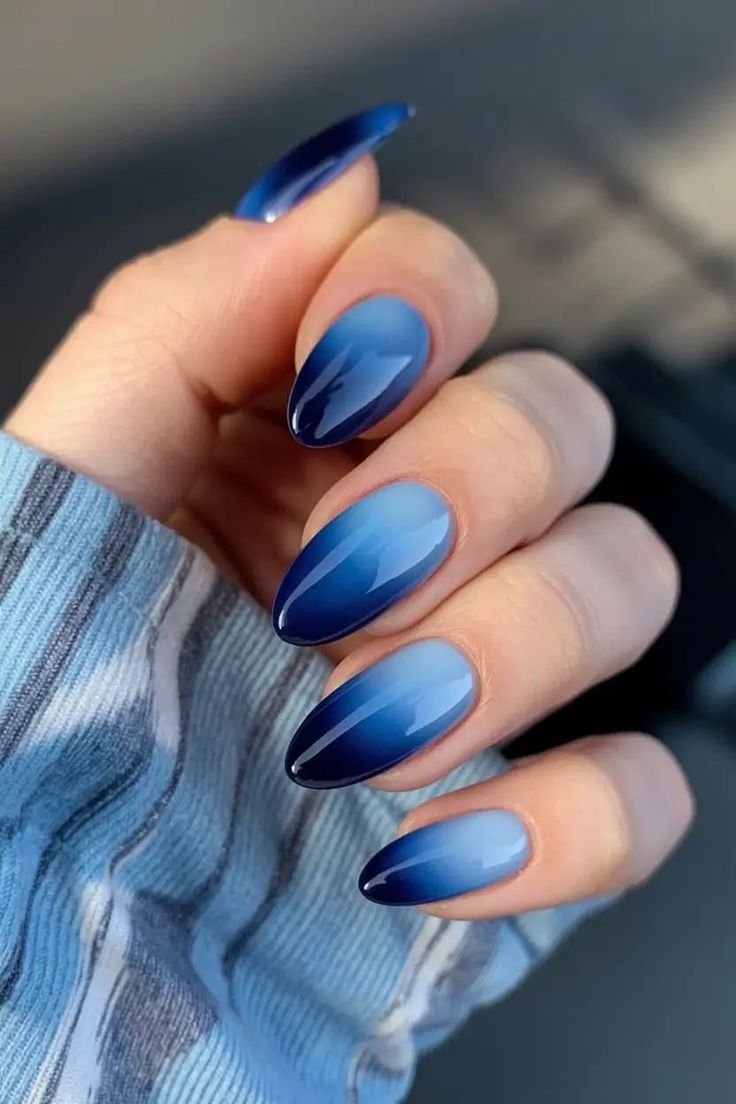 Deep blue ombre glossy almond nails